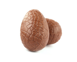chocolate dragon eggs on white background
