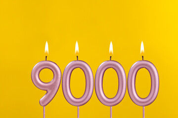 Candle number 9000 - Number of followers or likes.