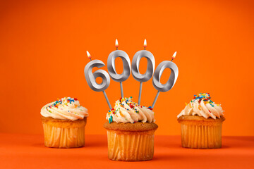 Number of followers or likes - Candle number 6000