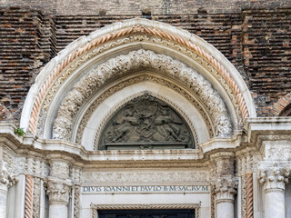 Italy, Venice. Old carving above the doorway of the Basilica dei Santi Giovanni e Paolo in Venice, Italy.