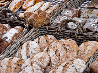 A variety of breads in baskets at a market in the town of Alkmaar.