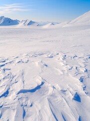 Landscape with Sastrugi at pass from Vestre Gronfjorden to Fridtjovbreen, Island of Spitsbergen. Arctic region, Scandinavia, Norway, Svalbard