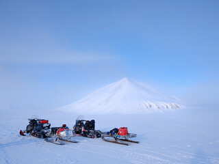 Expedition on glacier Rabotbreen with Nunatak Kopingfjellet in Sassen-Buensow Land National Park. Winter landscape on the island Spitsbergen in the Svalbard Archipelago. Scandinavia, Norway. © Danita Delimont