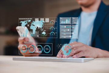 businessman looking at virtual data chart dashboard in concept of investment data analysis and DMS document audit financial Tax Fraud audit Using Magnifying Glass.