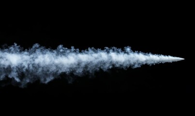 White cloud formation in the sky with dense wisps of vapor rising against a blackened background