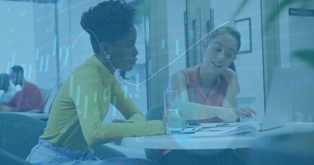 Image of financial data processing over diverse business people in office