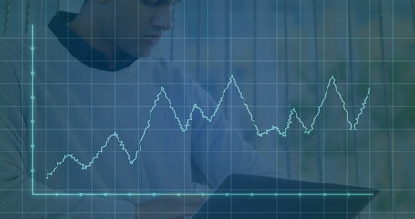 Image of shapes and diagrams over biracial businessman using laptop