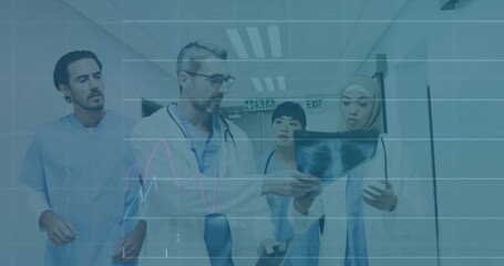 Image of financial data processing over diverse doctors in hospital