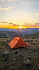 sleeping tent in the middle of a meadow surrounded by mountains and forest in a sunset with copy space vertically 9:16