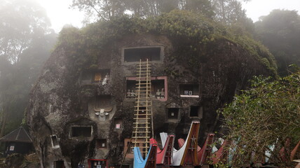 Coffins and graves are placed inside rocks. This is a tradition used as a burial place for the...