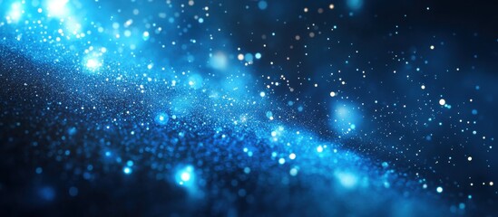 Obraz premium Stunning Blue Bokeh Effect with Sparkling Particles and Dreamy Light Reflections Creating an Ethereal Atmosphere for Backgrounds in Art and Design Projects