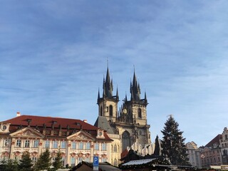 Fototapeta premium Christmas Magic in Old Town Square: Gothic Architecture and Festive Atmosphere. Christmas market