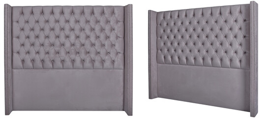 Elegant tufted upholstered headboard with nailhead trim in gray fabric. Isolated headboard