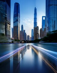 Fototapeta premium Modern city skyline at dusk, with light trails reflecting in the water.