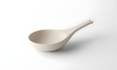 Beige, minimalist, scoop-shaped serving spoon isolated on white.