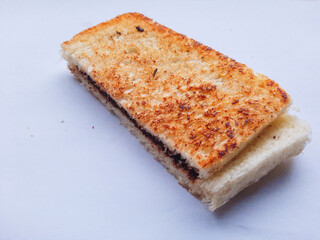 Slice of toast with Chocolate isolated on white view