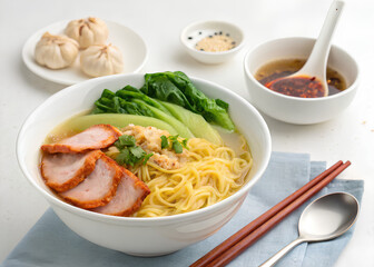 Egg Noodle with Grilled Red Pork. The setting is on isolated white, Cot out