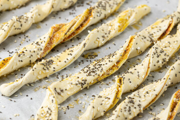 Salty and crispy puff pastry with sesame and chia seeds