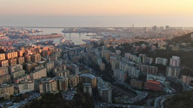 genoa city aerial shot drone at sunset old port district,genova from high point of view oregina san teodoro district