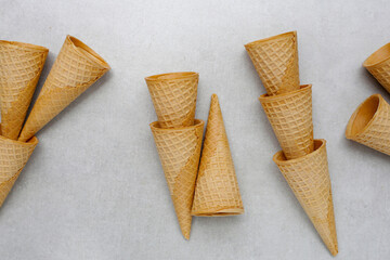 Waffle cones on grey background