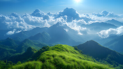 Fototapeta premium A beautiful sunset over a mountain range with a field of tall grass. The sky is a mix of orange and blue hues, creating a serene and peaceful atmosphere. The sun is setting behind the mountains