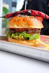 Indulge in a Delicious Gourmet Burger Crafted with Fresh Ingredients