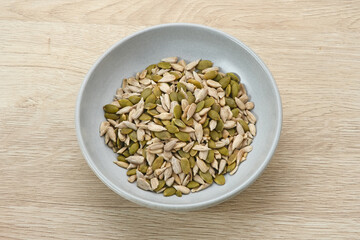 Peeled sunflower seeds and pumpkin seed, healthy food
