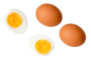 Top view set of two raw chicken eggs and cooked or boiled egg with egg yolk in two halves isolated on white background with clipping path