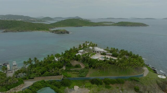 Aerial Forward Scenic View Of Luxurious House On Epstein Island Over Sea - VI, 
Little Saint James, United States of America