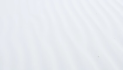 Obraz premium Minimalistic white wavy texture, perfect as a modern background or subtle design element for projects