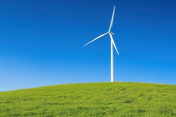 Fototapeta premium Isolated Wind Turbine on a Green Hill Under Clear Blue Sky, Representing Renewable Energy and Sustainable Development for Eco-Friendly Initiatives