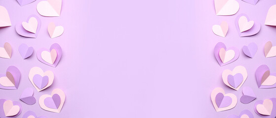 Many paper hearts on lilac background. Valentine's Day celebration