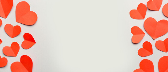 Obraz premium Red paper hearts on grey background. Valentine's Day celebration