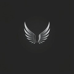 Obraz premium A sleek, modern logo featuring stylized wings on a dark background, symbolizing freedom and elegance.