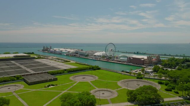 Aerial Panning Tranquil View Of Milton Lee Olive Park By Lake Michigan On Sunny Day - Chicago, Illinois