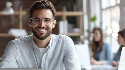 Obraz premium Smart businessman smiling at camera, wearing trendy transparent glasses
