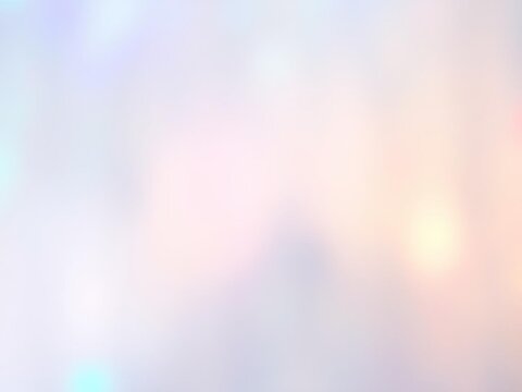 Blurred abstract holographic foil background with iridescent colors and light reflection, blurry, beauty, gradient
