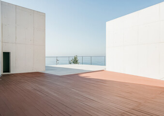 Fototapeta premium Contemporary architectural design featuring a serene ocean view at midday