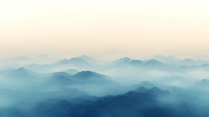 Mesmerizing and serene landscape with a captivating gradient of blue and white hues creating an ethereal and mystical atmosphere amongst the misty mountains