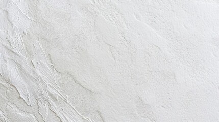 Obraz premium A textured white surface with subtle variations and patterns.