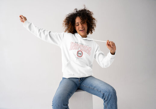 Mockup Of Woman Wearing Customizable Hoodie, Arm Out