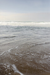 Calm Ocean Waves Lapping Praia da Adraga Shore