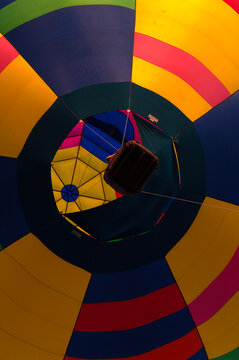 Hot air balloon flying directly overhead in Texas.