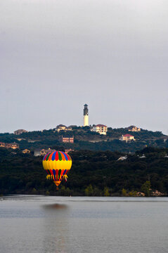 Hot air ballooning over Lake Travis in Austin, Texas.