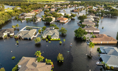 Hurricane Debby tropical rainstorm flooded residential homes in suburban community in Sarasota,...