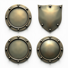 A collection of four metallic shields showcasing a variety of designs, highlighting their shiny surfaces and decorative borders.
