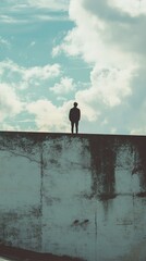 Solitude: A Man Contemplates Life on a Wall