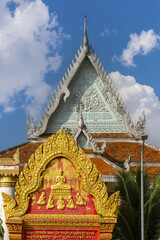 Decorative Doorway and Pagoda in Wat Ounalom a wat located on Sisowath Quay in Phnom Penh, Cambodia