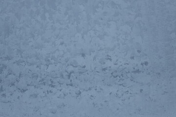 A person skiing down a snow-covered mountain slope, enjoying the winter landscape.
