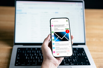 Businesswomen checking email via smartphone have spam malware screen alerts, cyber internet web hack attacks, warning errors, sniffing attacks, phishing, cybersecurity network concept